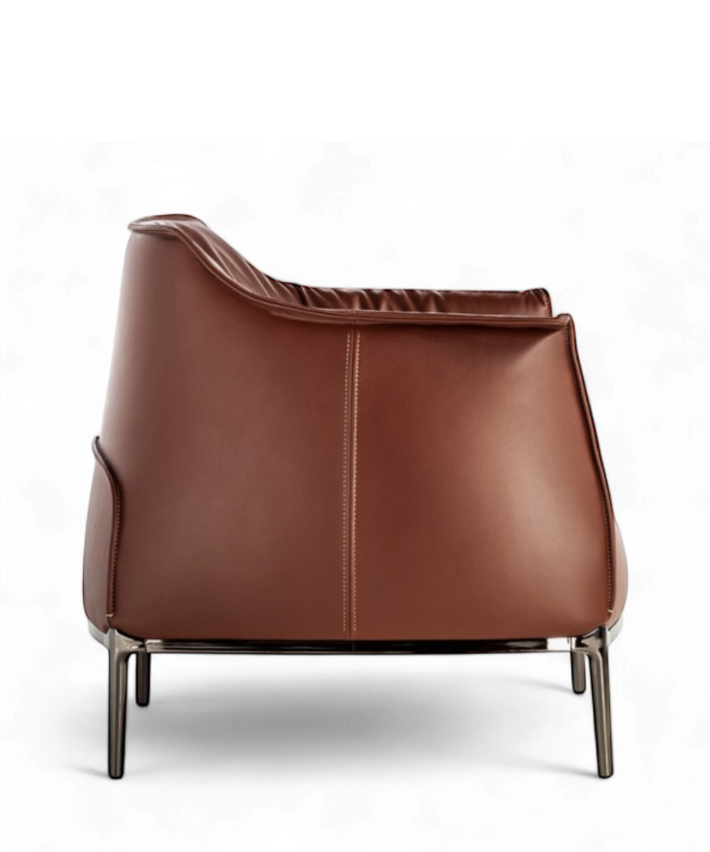 Fauteuil Archibald par Jean-Marie Massaud pour Poltrona Frau, cuir marron finement surpiqué et piètement en acier teinté, design contemporain iconique.