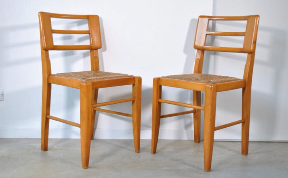 6 chaises paillées par Pierre Cruege