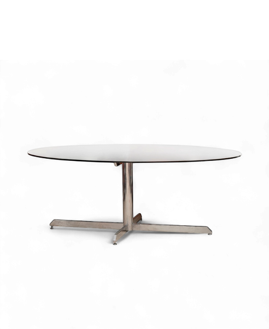 Table de salle à manger en verre et acier chromé par Florence Knoll, éditée par Roche Bobois dans les années 1970.