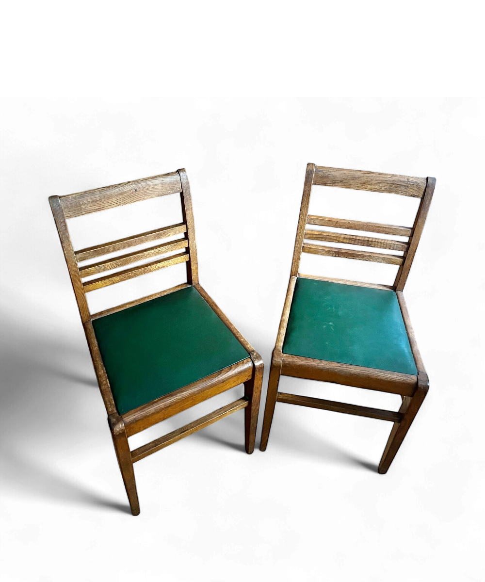 Chaise en chêne par René Gabriel, design français des années 1950, emblématique du mobilier de la Reconstruction.